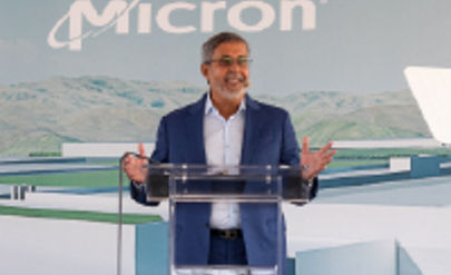 Micron CEO speaking at a podium