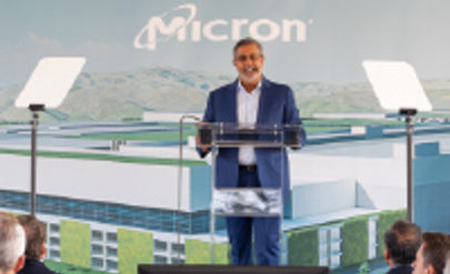 Micron CEO speaking at a podium