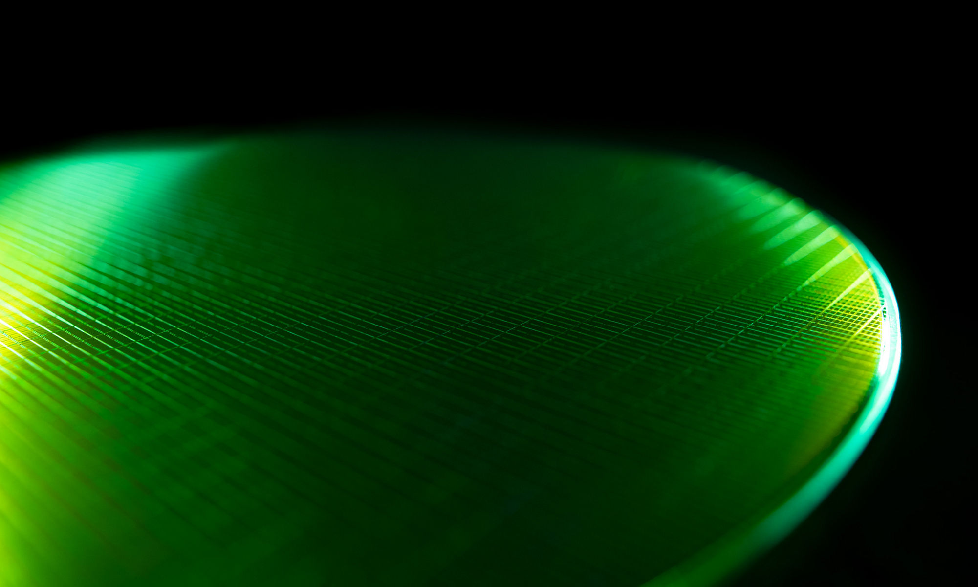 Green circluar image in dark background