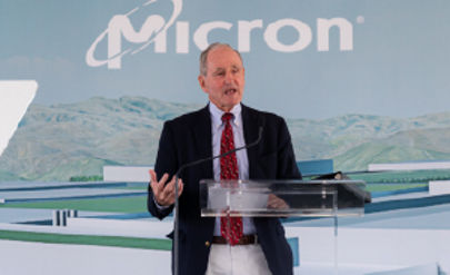 Micron Executive speaking at a podium