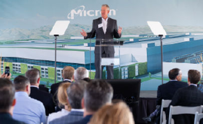Micron Executive speaking at a podium