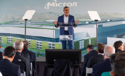 Micron CEO speaking at a podium