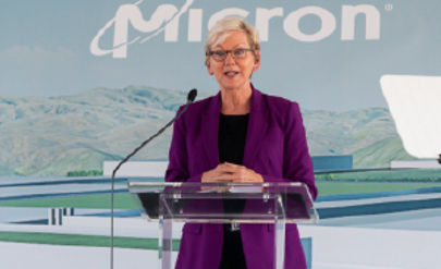 Micron Executive speaking at a podium