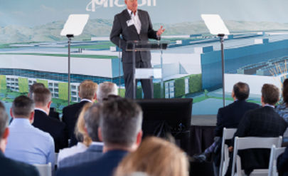 Micron Executive speaking at a podium