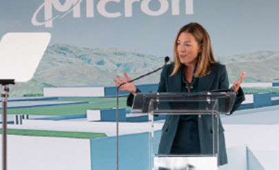 Micron Executive speaking at a podium