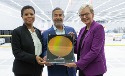 Micron Executives holding an award