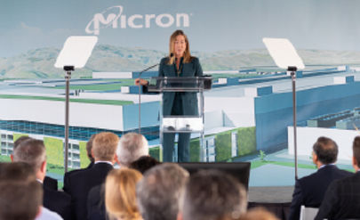 Micron Executive speaking at a podium