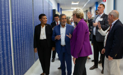 Micron Executives walking in a coridor