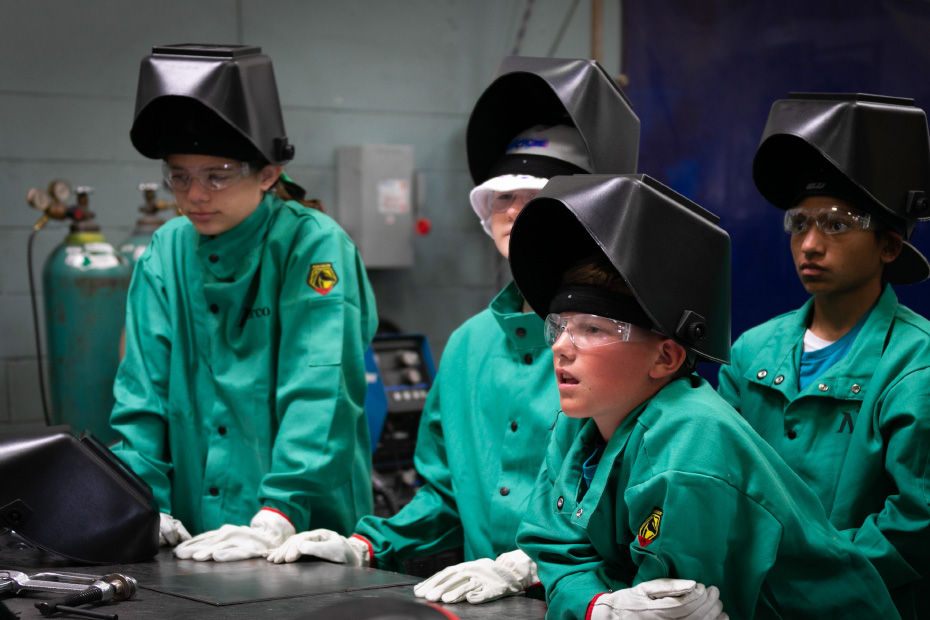 Chip Camp students lwatch instructor demo welding techniques