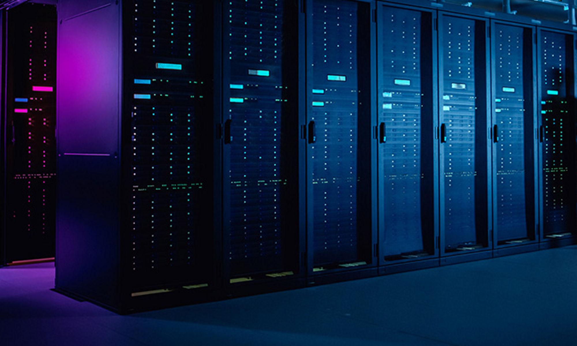 Server room dimly lit in blue and violet hues 