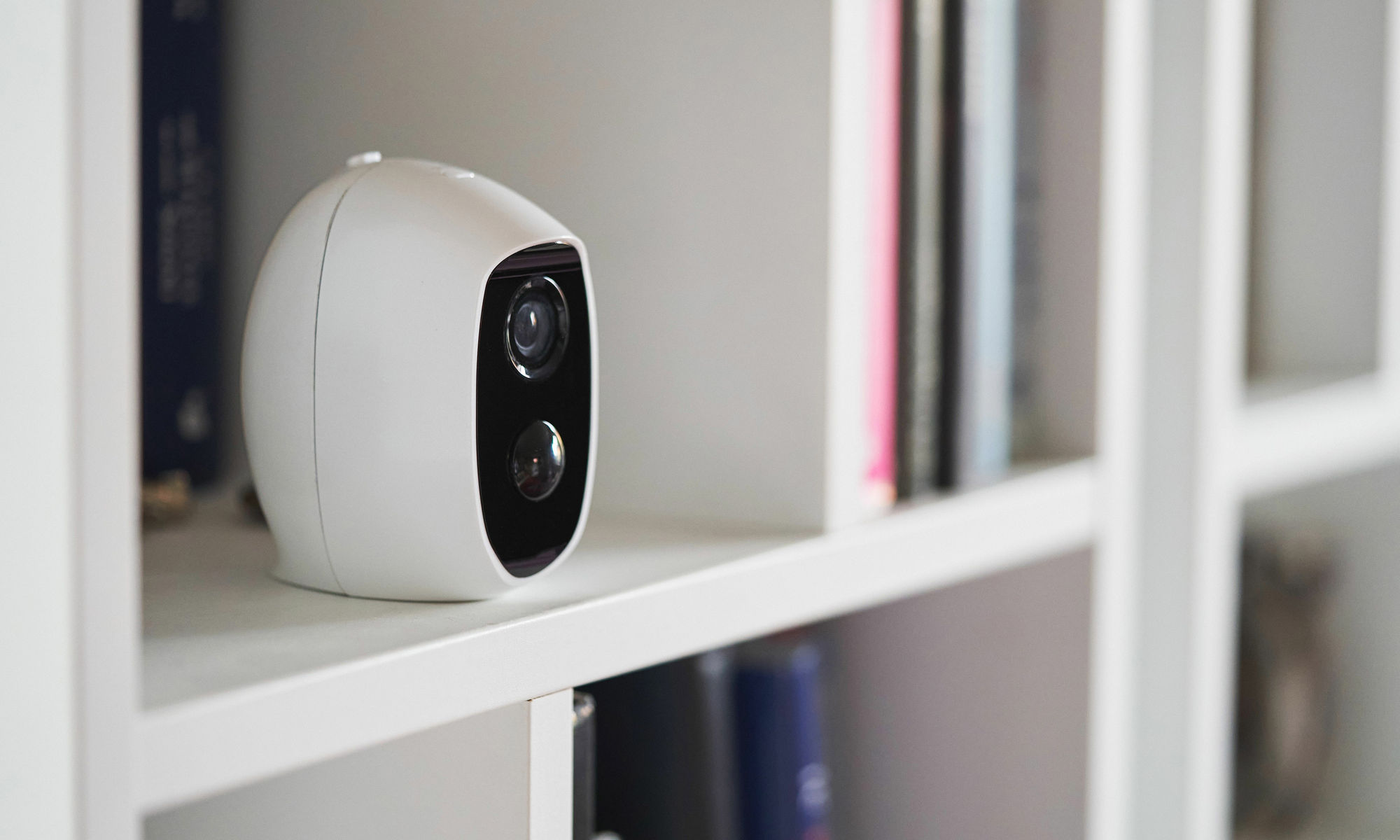 webcam on a book shelf