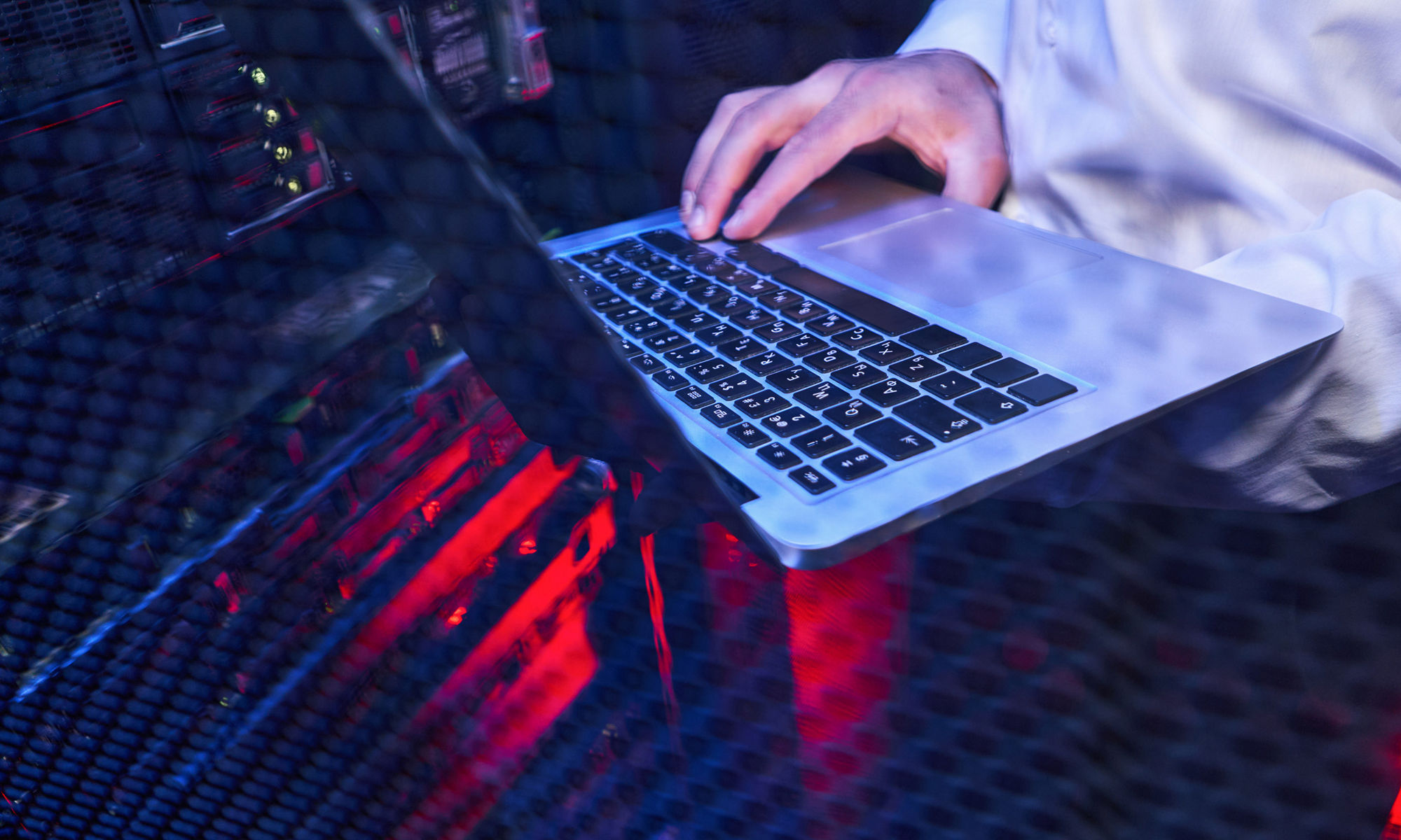 Busy maintenance administrator controlling operational server rack optimal functioning