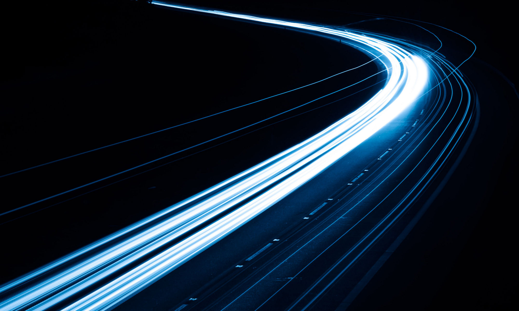 Abstract blue car lights at night