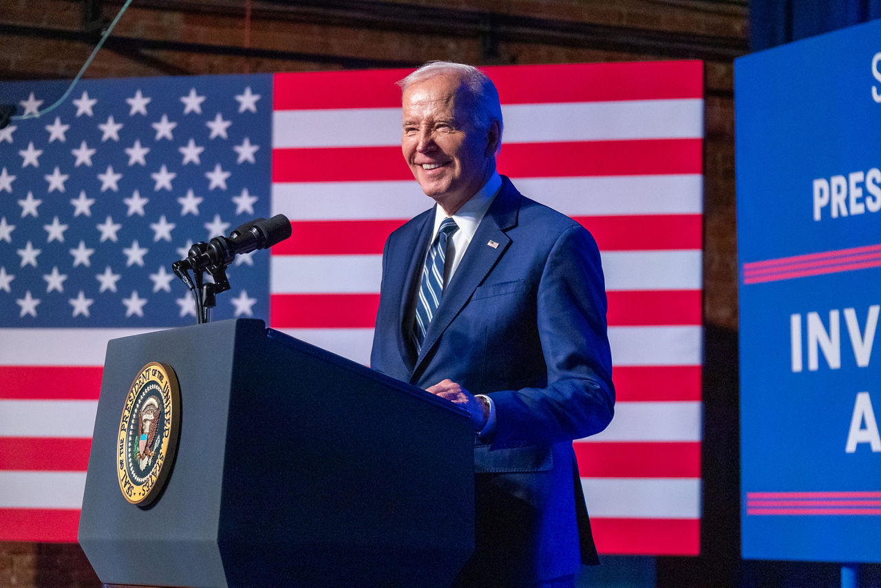 presited biden standing at a podium