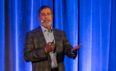 Micron Chairman, President and CEO Sanjay Mehrotra addressing the audience