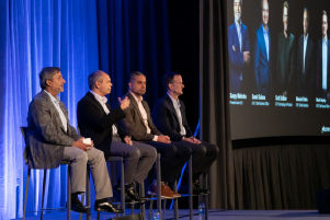 Micron Chairman, President and CEO Sanjay Mehrotra along with other business executives