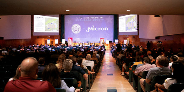 People seated at a micron conference