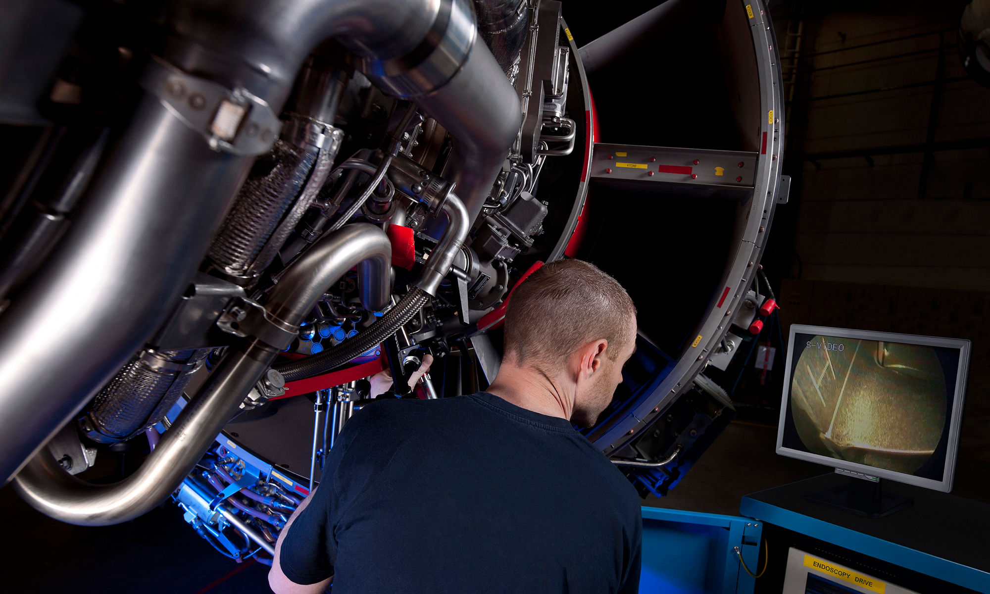 An aerospace engineer working with large machinery
