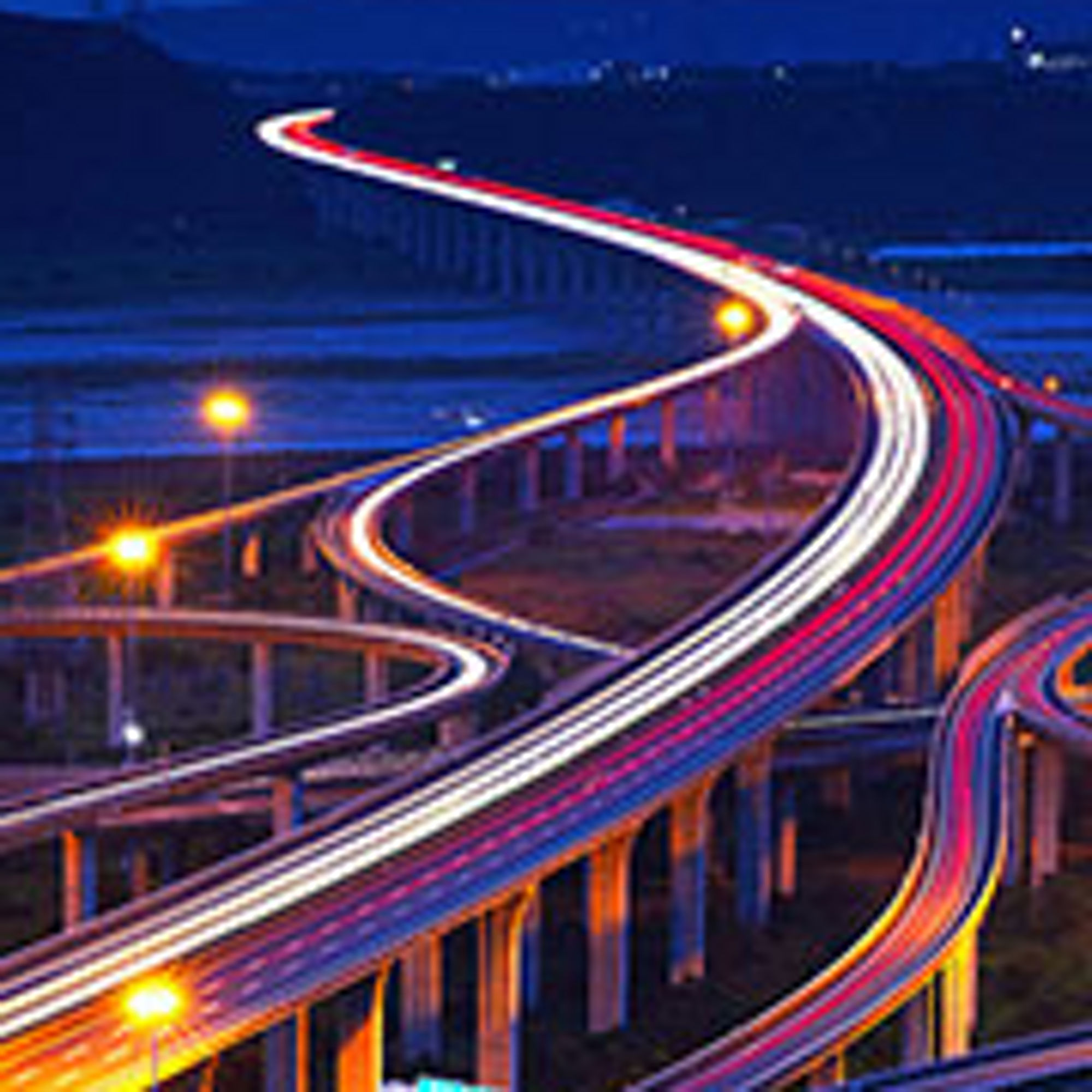 Multiple highways looping around with lights