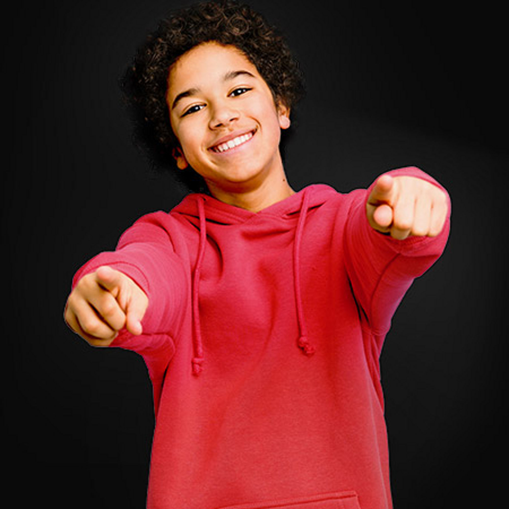 Boy in red hoodie pointing