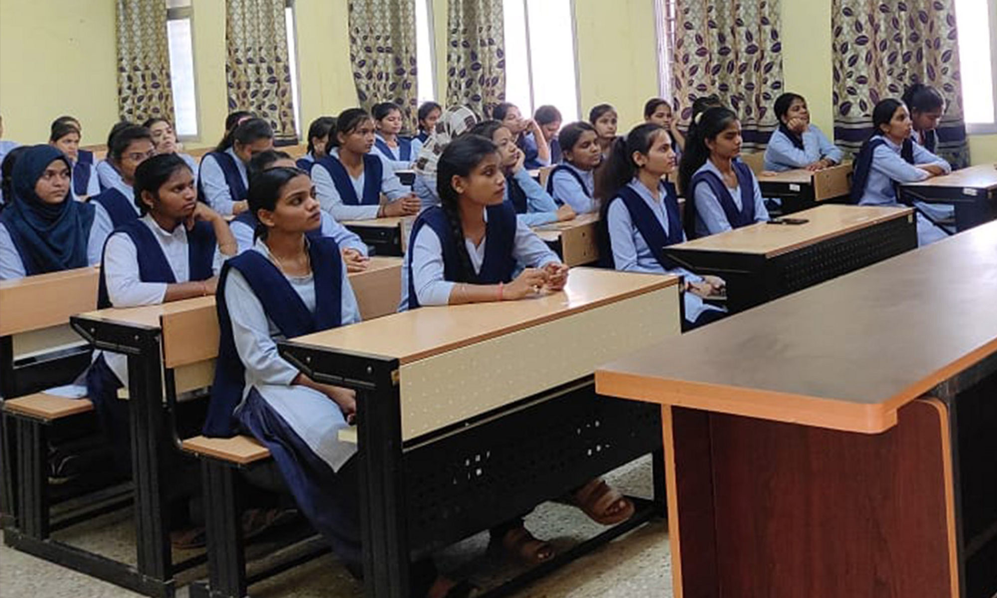 Class of students sitting at desks