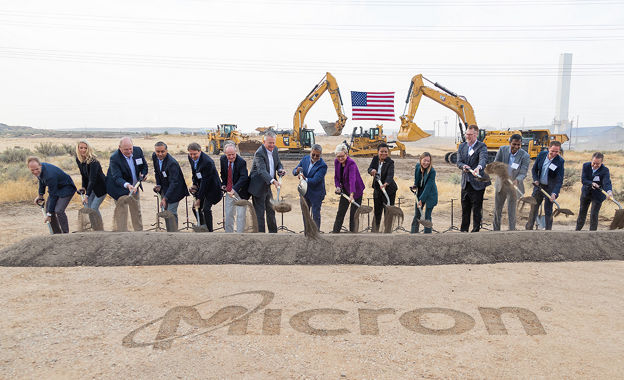 Micron Executives digging sand at new Micron construction site