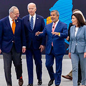 micron CEO Sanjay Mehrotra standing with Joe Biden and other politicians