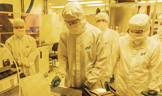 Micron employees working in Lab