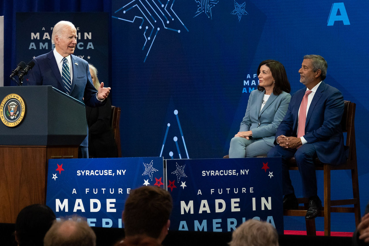 President Joe Biden taking a moment to chat with Micron Chairman, President and CEO Sanjay Mehrotra on stage