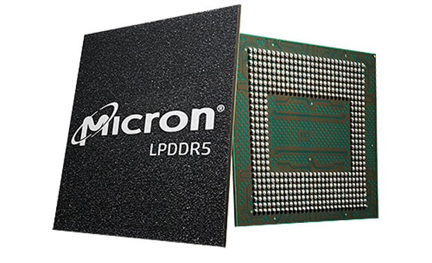 a micron executive speaking at a podium