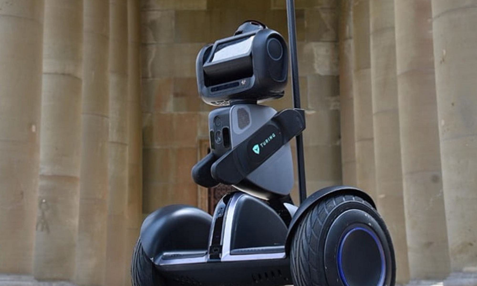 Security robot with columns in the background