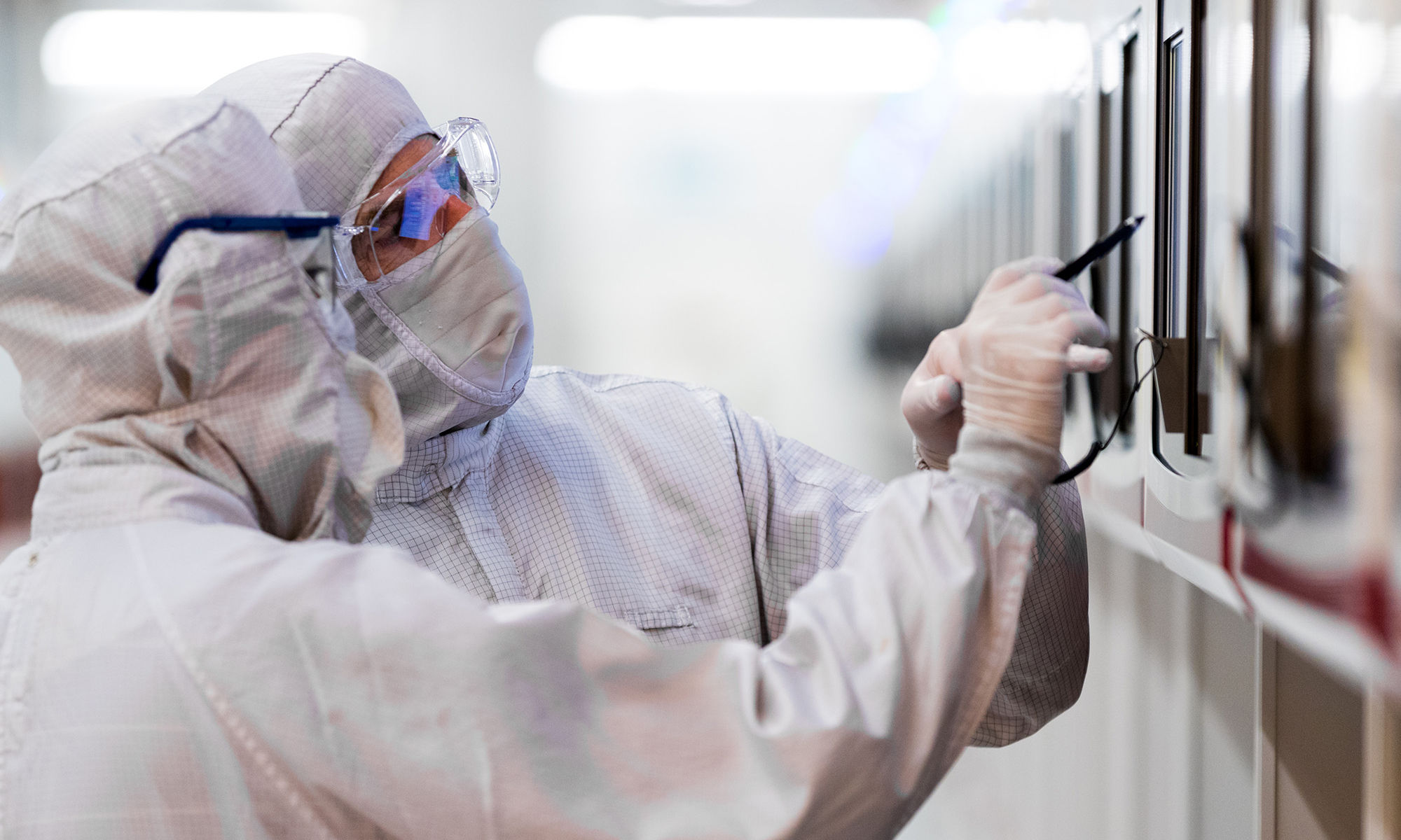 lab technician building a component