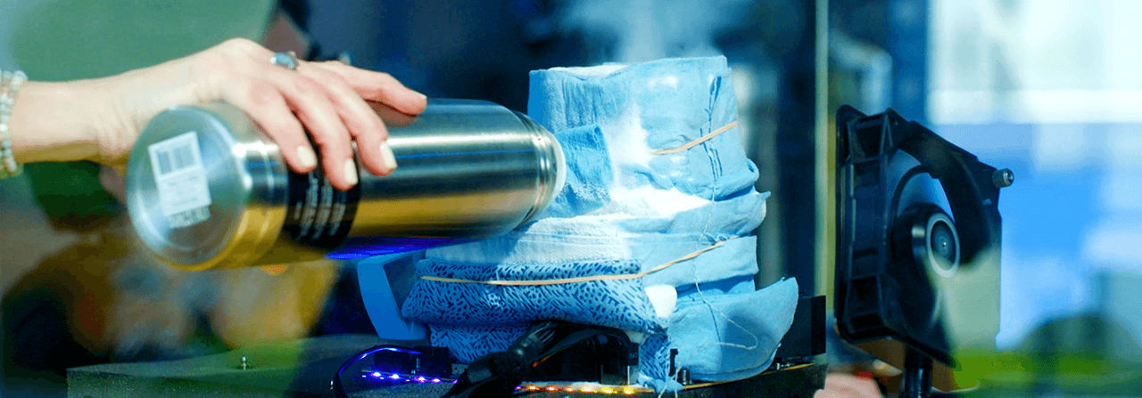 Person pouring water on towels