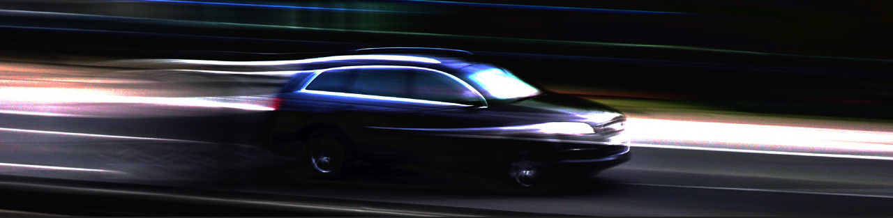 Automobile on the road at night