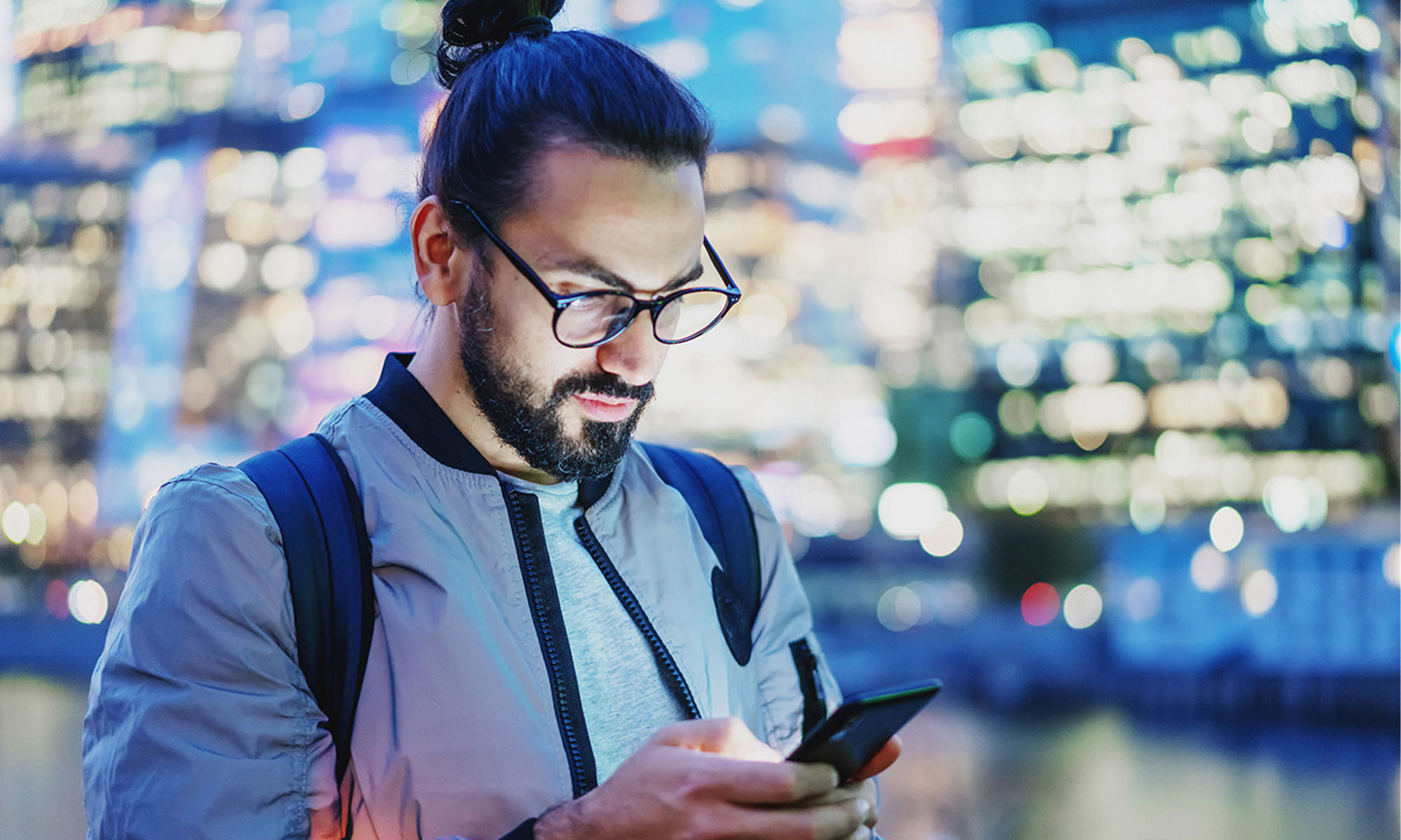 Man using his mobile device