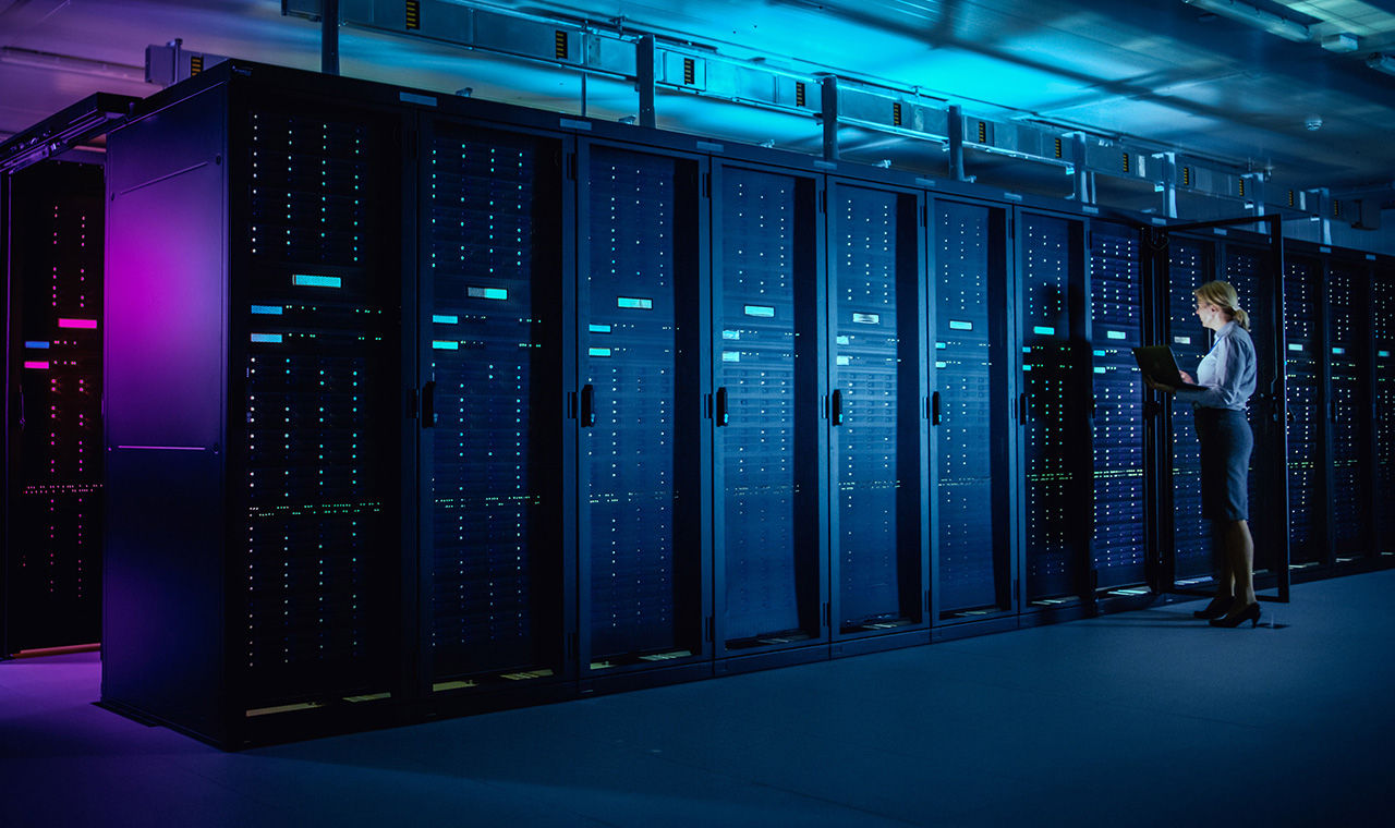 image of an employee in a server room
