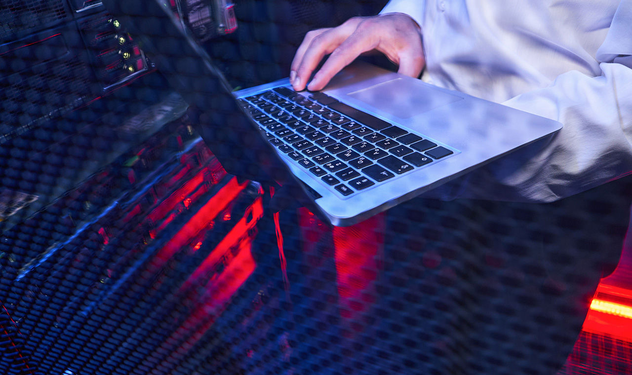 Zoomed in shot of hand on a keyboard in abstract setting