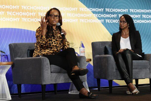 Sharawn Connors, VP of Diversity, Equality and Inclusion (left) onstage at Techonomy 19 speaking about the importance of diversity in the workplace.