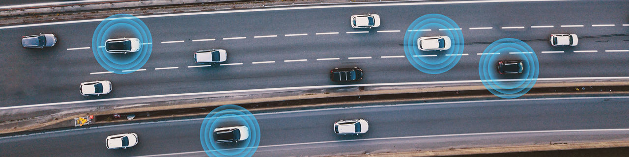 smart cars driving on the road driverless vehicles aerial top view from above