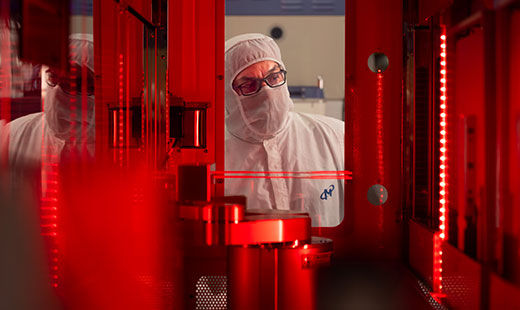 man working at a micron lab