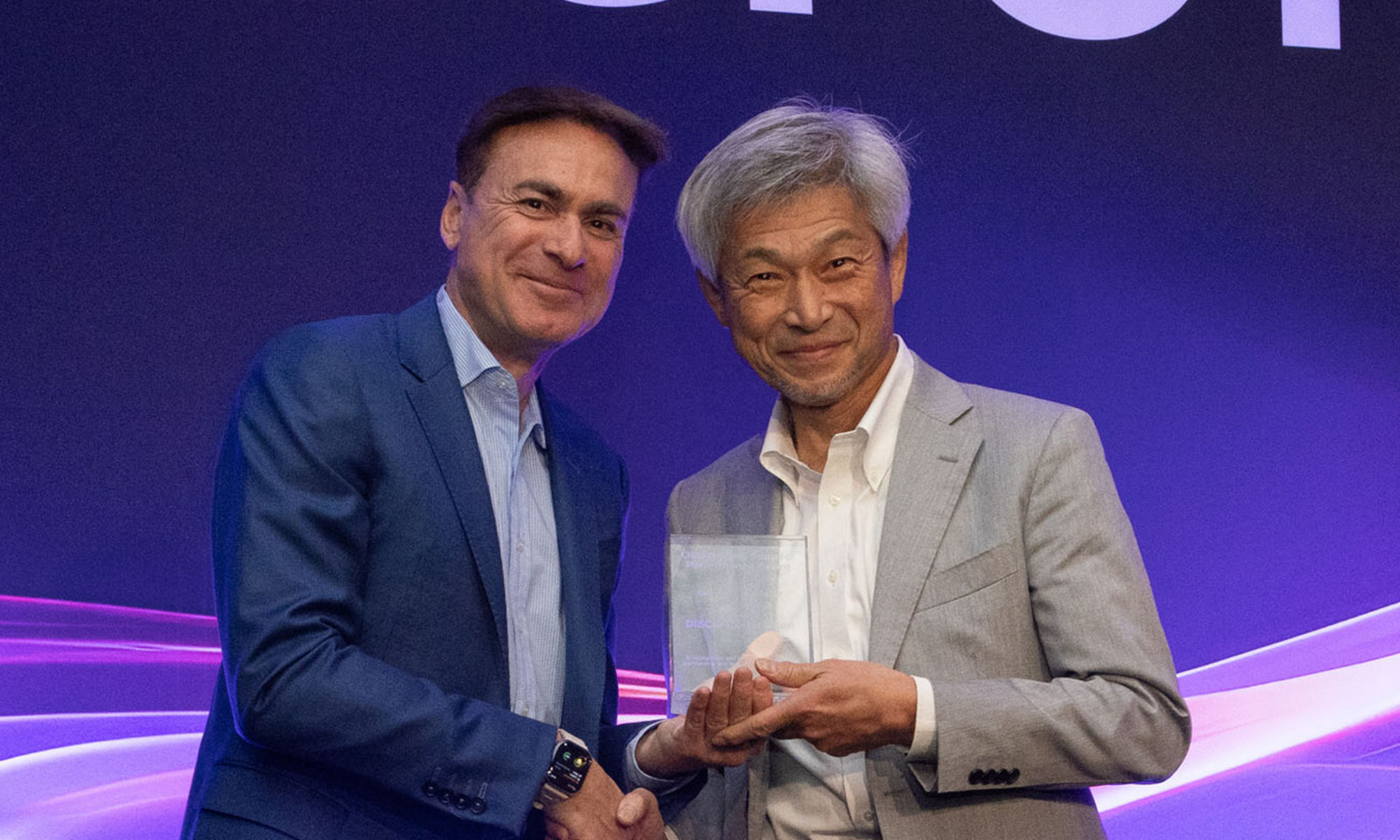 Ben Tessone presenting the award to noboru yoshinaga