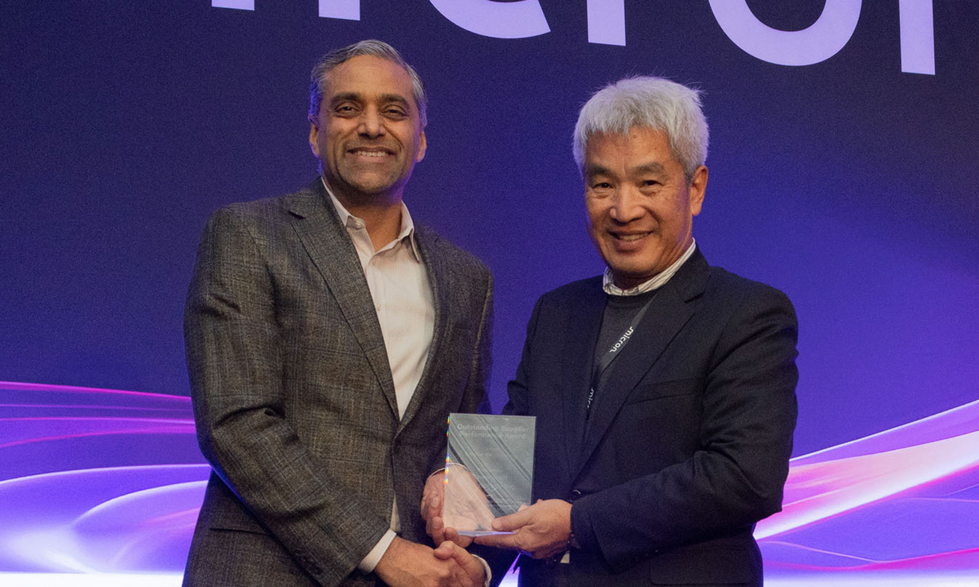 Manish Bhatia presenting the award to Boris Hsieh