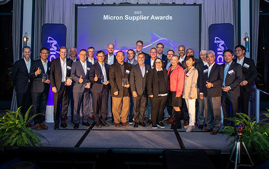 group photo of micron executives at micron supplier awards event